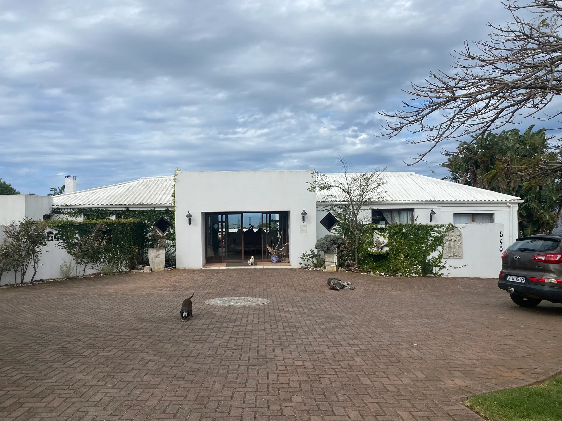 Schafli Manor front entrance with parking area